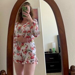 Super cute floral Romper. Disney Beauty and the Beast Brand.